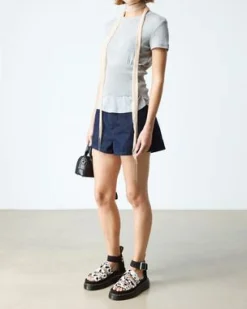 Clarissa Quad-sandaler med rem i Hair On-læder in Cremefarvet & Sort